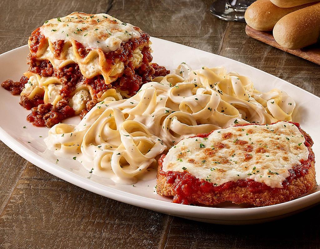 Olive Garden Italian Restaurant signature dishes Tour of Italy (Lasagna, Chicken Parmigiana, and Fettuccine Alfredo)Unlimited Breadsticks and Garden SaladFettuccine Alfredo